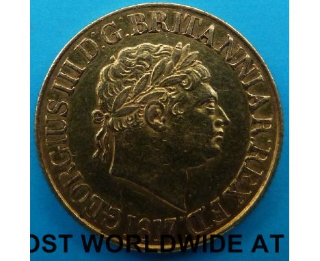 A cased George III 1817 gold full sovereign, VF, the first year of the "modern" sovereign