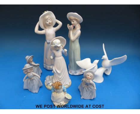A Royal Albert Beatrix Potter figure, a Coalport bird group and Lladro style figures including Cellini