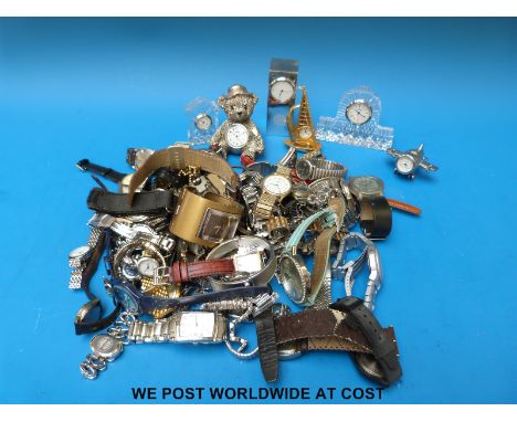 A collection of wristwatches and novelty clocks including a vintage Oris. 