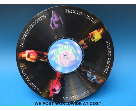 Rare 1973 3D Picture Disc LP: Saturnalia “Magical Love” (Matrix Records TRIX 1SP).  Apparently this is the world's first 3D v