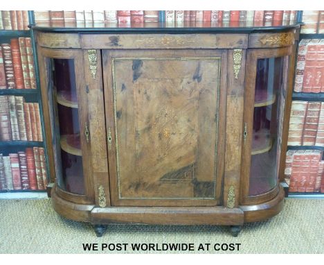 A 19thC inlaid walnut breakfront credenza with two bow glazed cupboards either side of a larger inlaid central cupboard with 