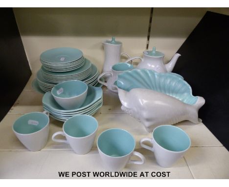 A Poole pottery tea set and a large Poole conch shell