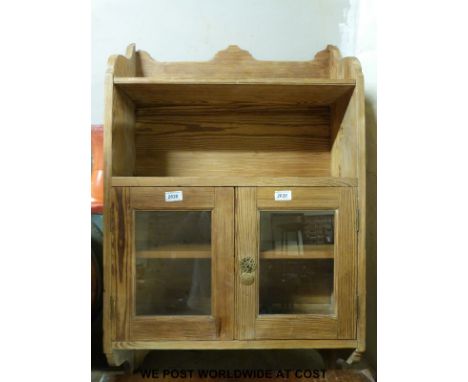 A pine hanging cupboard and shelf unit (W61 x D18 x H96)