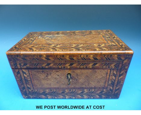 A walnut parquetry inlaid tea caddy, (21cm x 12cm x11cm).