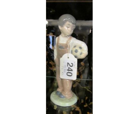 A Lladro cobbler (hammer restored), Nao boy with football, Nao girl and Lladro girl (finger a/f)