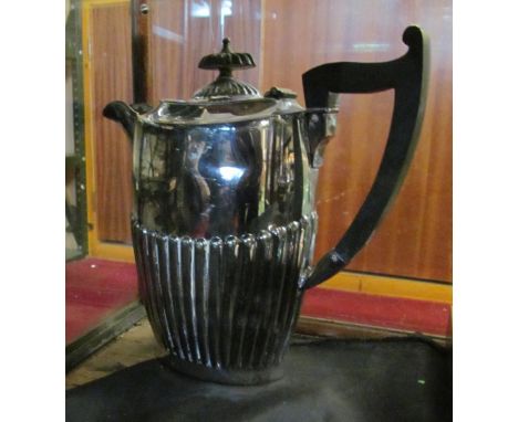 A three-piece plated teaset, hot water jug, plated ladle and some spoons