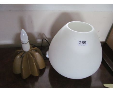 A modern lamp with opaque shade