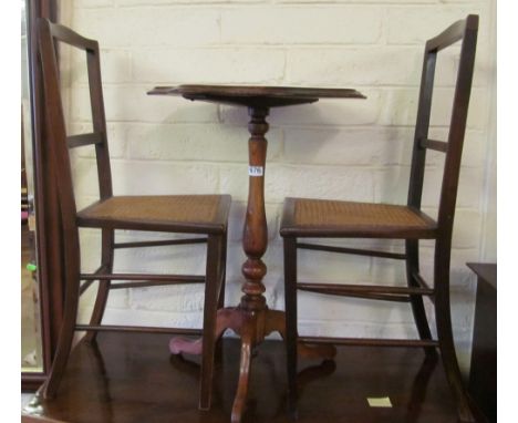 An oak pillar and tripod table, two cane seated chairs and card table