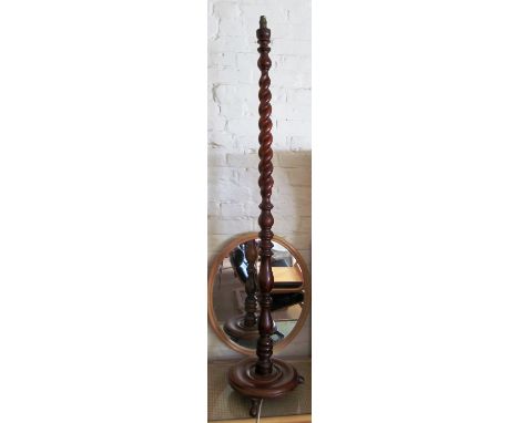 A standard lamp with barleytwist column