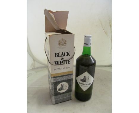 A bottle of Black &amp; White Scotch Whisky