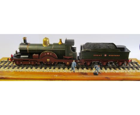 A guage one locomotive and tender Great Western Railway Achilles on a track in glass cabinet built around turn of the century