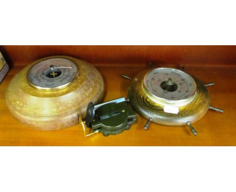 Two barometers and a compass