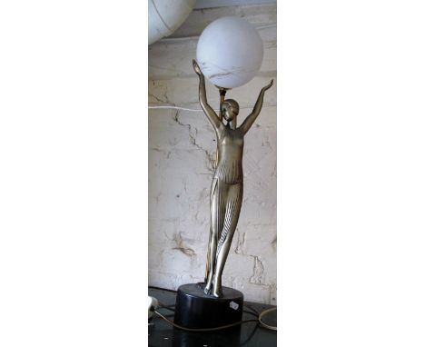 An Art Deco style lamp lady with arms in air