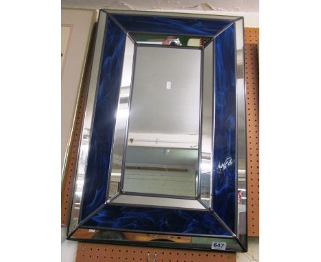 A blue and silvered glass mirror
