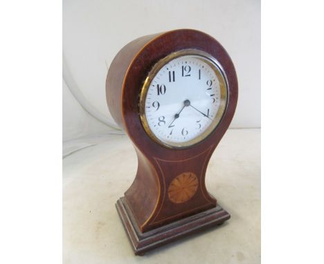 An Edwardian mahogany clock