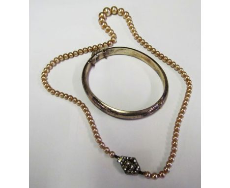 A cased pearl necklace, pearl effect necklace and silver bangle