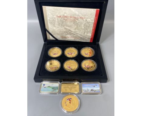 Lot containing gold plated coins and medallions to include The First World War collection and 3 Concorde bars 