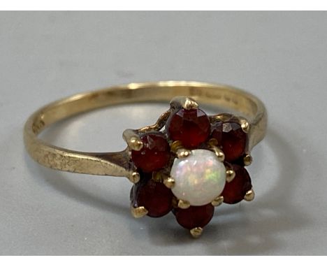 9ct gold garnet and opal ring, weight 1.3 grams size K 