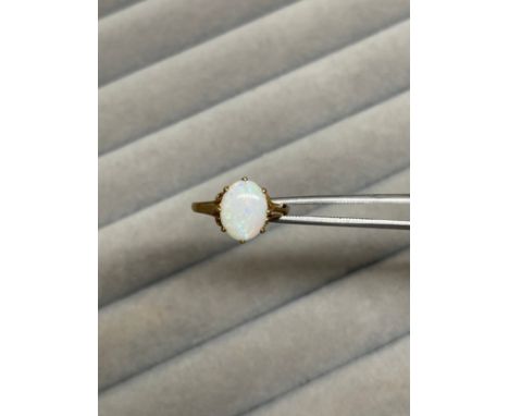 9ct Yellow Gold Fully Hallmarked Single Opal Ring Set in a Fancy Design Mount Weighing 1.93 grams Size K 1/2 