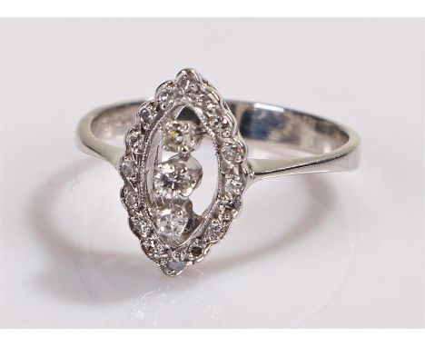 Diamond set ring, the head in a naiveté form set with round cut diamonds, ring size M