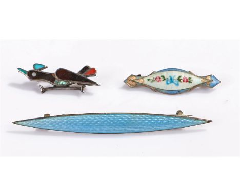 Silver enamel jewellery, to include a blue guilloche enamel brooch, another enamel brooch and a stylised bird example, (3)