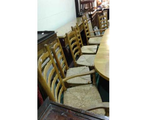 Set of six oak ladder back chairs, to include two carvers and four singles, (6)