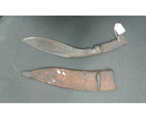 An interesting British Indian Army Mark II military Kukri with leather scabbard , the blade is stamped RFI for the Rifle Fact