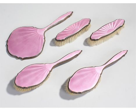 Silver plated guilloche enamel vanity set, to include the mirror and  four brushes, (5)