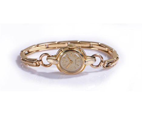 Omega gold plated ladies wristwatch, the signed dial with Arabic and baton hours, manual wound, the case 15mm diameter