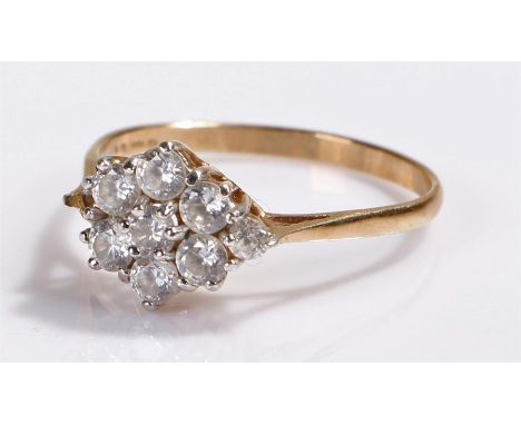 9 carat gold ring, set wit cubic zirconia, one stone missing 