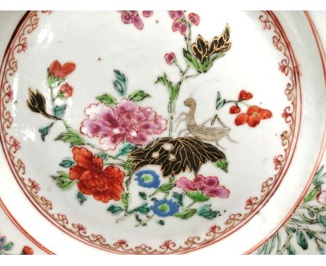 A Chinese 18th Century polychrome enamel export plate with an insect resting on a flower head,  diameter 22.5cm, together wit