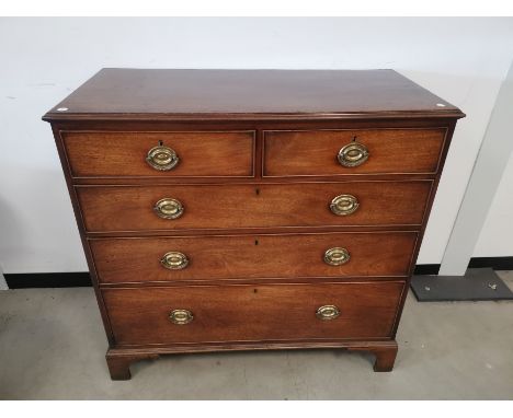 19th Century two over three chest of drawers,  two half drawers with three graduated full length drawers, bracket feet, brass