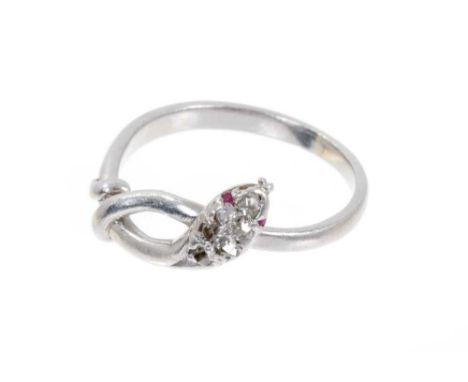 Antique diamond and platinum snake ring with six pavé set old cut diamonds and ruby eyes. Ring size G