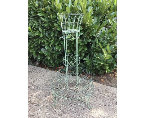 Victorian wirework two tier planter on scroll feet 105cm high