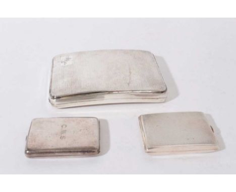 George V Silver Cigarette case of curved rectangular form with engine turned decoration (Birmingham 1929) together with two s