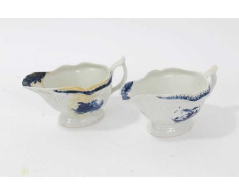 Pair of Worcester blue and white porcelain 'Little Fisherman' sauce boats, c.1760, crescent and worker's marks, one heavily r