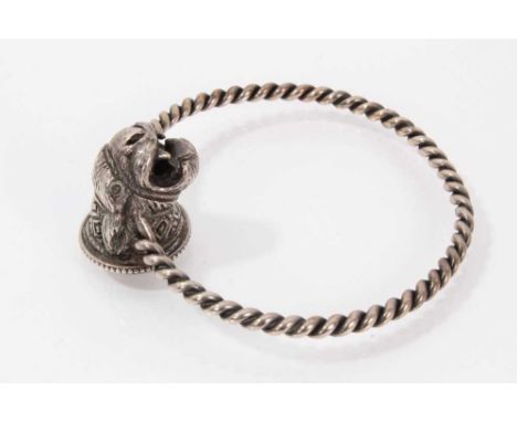 Unusual antique Tiffany &amp; Co. silver rope twist bangle, the cast silver animal's head with engraved gothic monogram. Sign