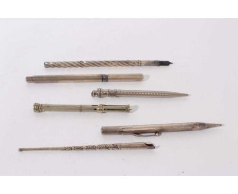 Early 20th Century Silver fountain pen with engine turned decoration engraved 'The Swan Pen' together with five silver and wh