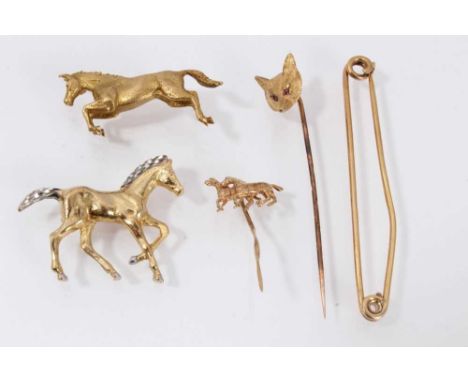 9ct gold brooch in the form of a horse jumping (Birmingham 1980), another similar brooch and stick pin together with a 9ct go