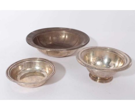 Early 20th century American silver dish of circular form with engraved foliate and scroll decoration, underside stamped Sterl