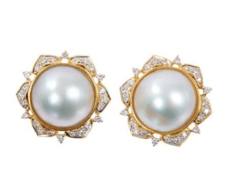 Pair of Mabe pearl and diamond earrings, each with a large cultured Mabe pearl measuring approximately 16mm diameter in 18ct 