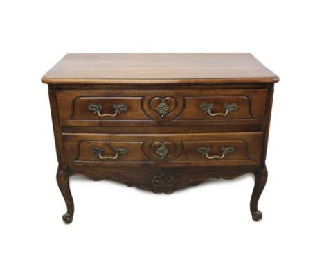 18th century French walnut bowfront commode with two drawers, each with heart shape incised ornament, with conforming frieze 