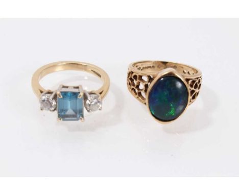 Two 9ct gold dress rings, one with an opal doublet, the other with synthetic stones. Sizes L½-M.