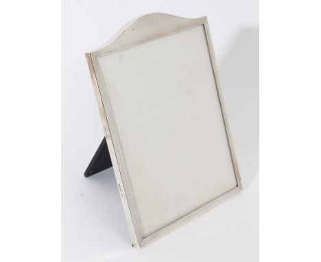 Good quality large George VI silver photograph frame of rectangular form with arched top and engine turned decoration, with e