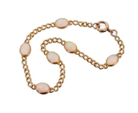 Edwardian-style gold and opal bracelet with six oval cabochon opals in collet settings with curb links, 19cm length