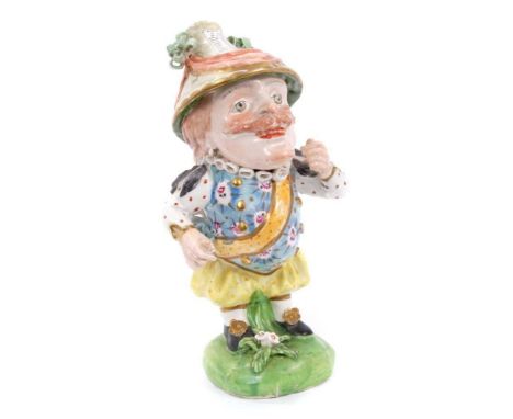 Derby model of a Mansion House Dwarf, c.1820, richly attired in 17th century cavalier costume, wearing a floral waistcoat, or