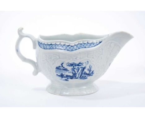 Rare Worcester blue and white sauceboat, c.1760, printed with the Fisherman and Billboard Island pattern, 20cm lengthProvenan