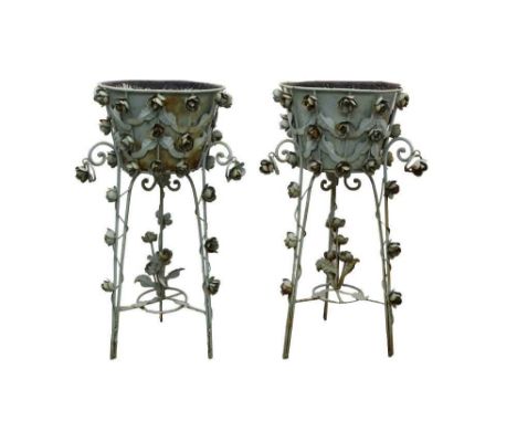 Pair of decorative painted jardinières, tapered form on wire work tripod base with applied rose ornsment, 88cm high