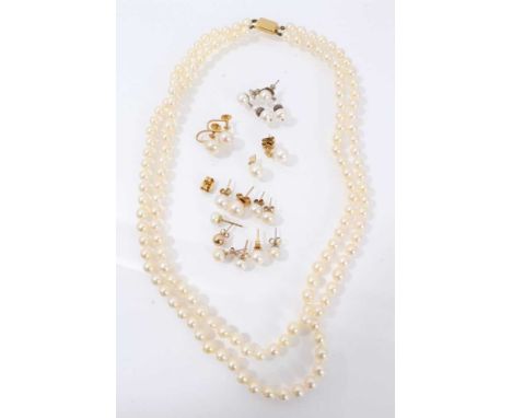 Cultured pearl two strand necklace and a collection of cultured pearl and simulated stud earrings