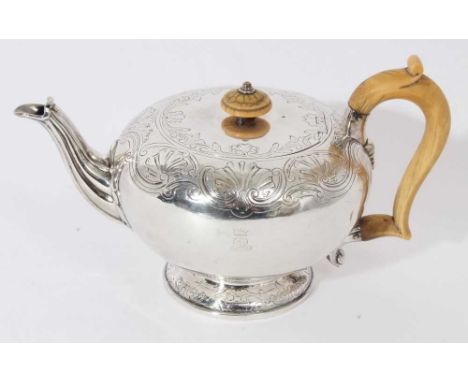 George IV silver teapot of bullet form with chased scroll and shell decoration, engraved Ducal crown and initials, flush fitt